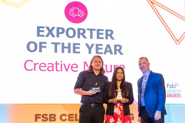 Julianne Ponan CEO and Matt Ford of Creative Nature, with the FSB National Awards Exporter of the Year trophy. They are pictured with Anton Gunter, Managing Director of Global Freight